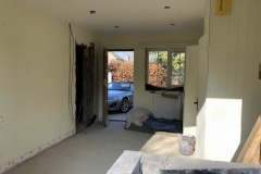 A hole in the wall for the bedroom door